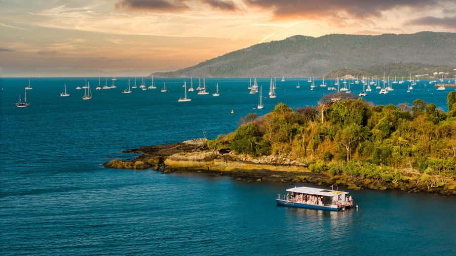 Airlie Beach: 2-Hour Sunset Cruise with Sparkling Wine - Pioneer Bay at golden hour