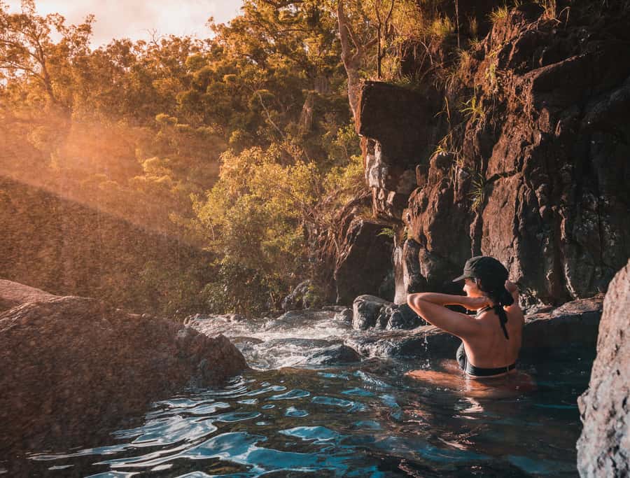 Airlie Beach: Cedar Creek Falls & Northerlies Beach Day Trip - From rainforest plants to rockpool time