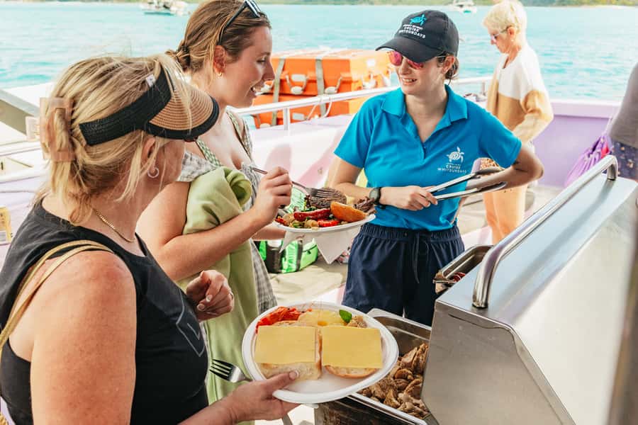 Airlie Beach: Whitsundays Full-Day Camira Sailing Adventure - Snorkeling at a Whitsunday fringing reef