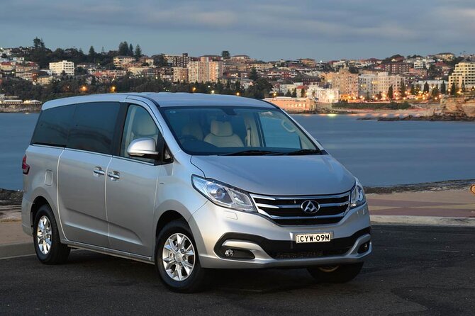 AIRPORT TRANSFER between Cairns Airport & Port Douglas (6am-5pm) - Port Douglas drop-off at your door
