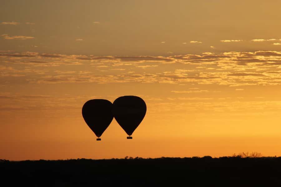 Alice Springs: Early Morning Hot Air Balloon Flight - Packing the balloon in the desert