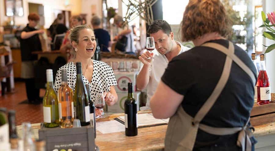 Barossa Valley: Maggie Beer's Wine Tasting & Cheese Platter - A full glass and cheese beside the dam