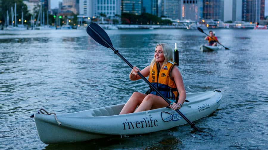 Brisbane: Illuminated River Night Kayak Tour - Brisbane River after dark, from a kayak seat