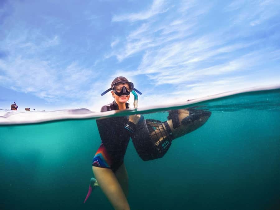 Brisbane: Moreton Island Return Ferry & Adventure Day Pass - Stand-up paddle boarding after the swim