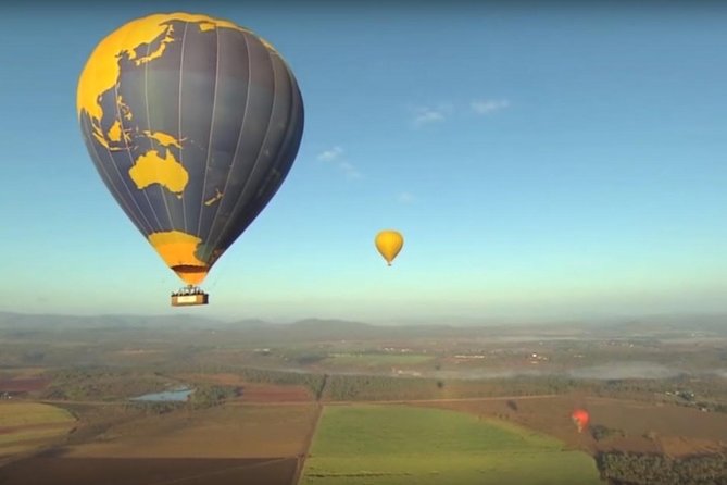 Cairns Classic Hot Air Balloon ride - Landing, laughter, and the balloon pack-up