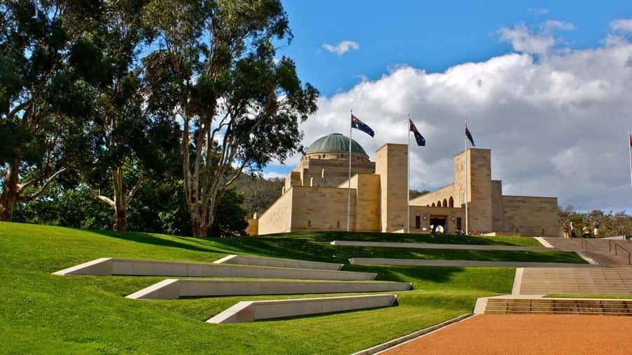 Canberra: City Highlights Day Tour with Entrance Fees - Duntroon and the city seen from the road