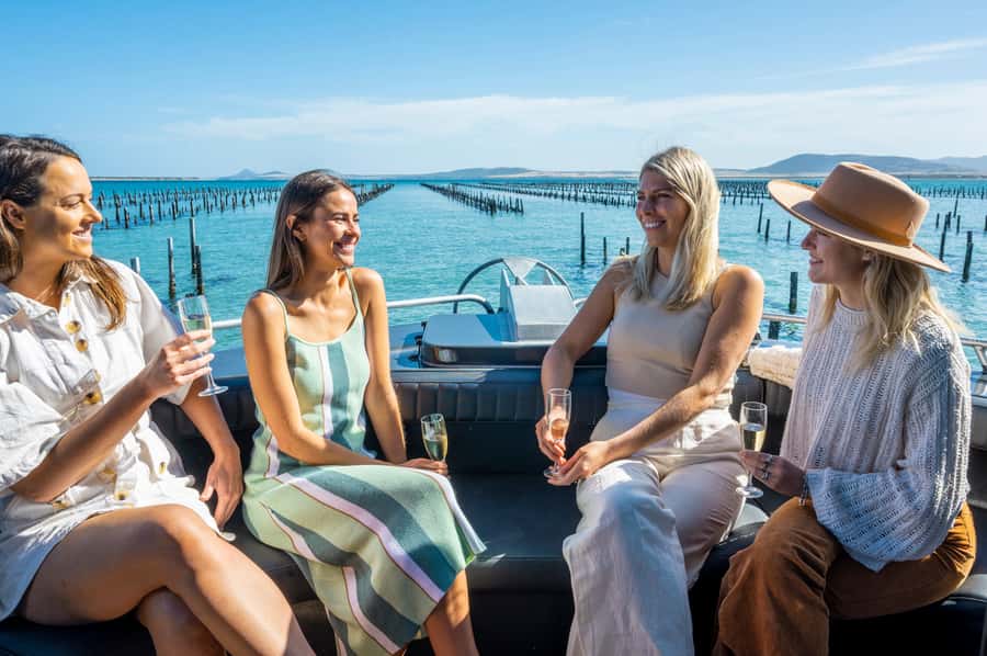 Coffin Bay: Oyster Farm Boat Tour with Wading & 12 Oysters - Wading through the oyster farm