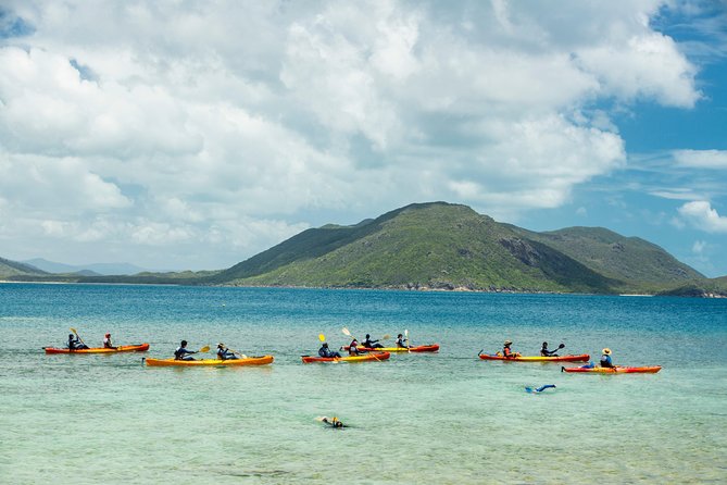 Fitzroy Island Day Tour from Cairns - Nudey Beach, coral shores, and dry-land scenery