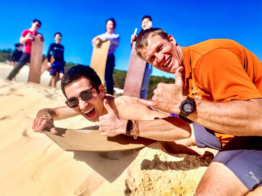 From Brisbane: Moreton Island Full-Day Trip - Sand tobogganing in The Desert