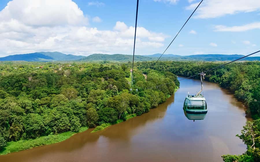 From Cairns: Self-Guided Kuranda Trip with Train and Skyrail - Riding the Kuranda Scenic Railway through Barron Gorge