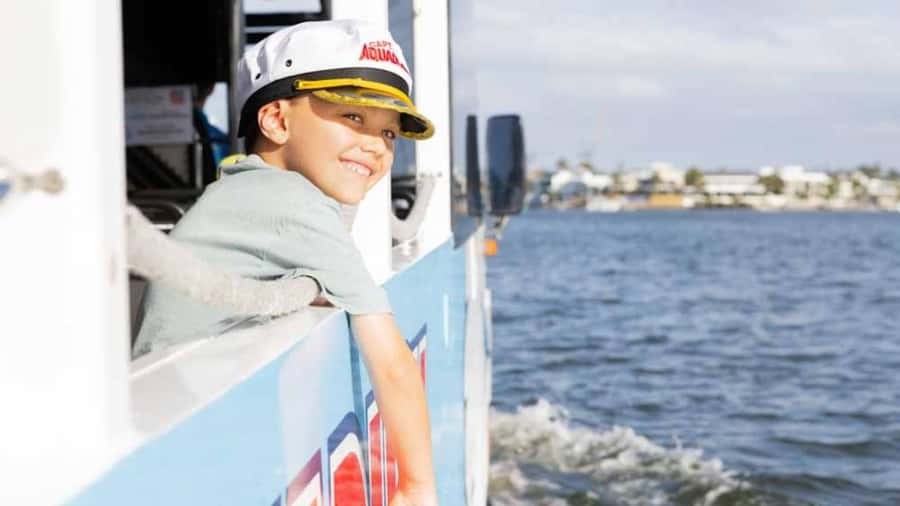 Gold Coast: 1-Hour Land and Water Duck Tour - Cruising past boats, houses, and the Broadwater