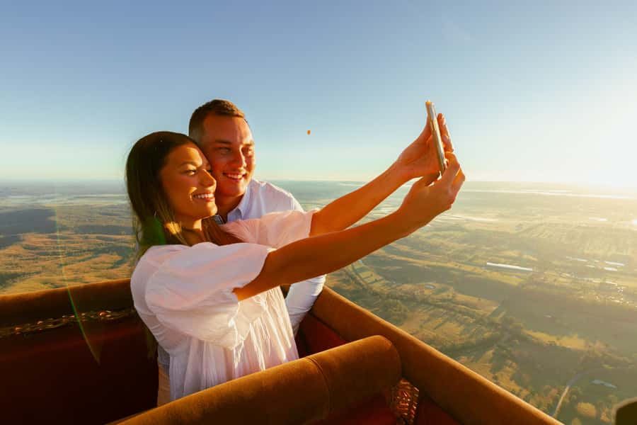 Gold Coast: Hot Air Balloon Flight and Vineyard Breakfast - Landing, folding the balloon, and receiving your photos