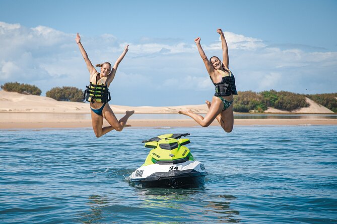 Gold Coast V8 Jet Boat Rapid Ride - The Sovereign Islands mansions from the water
