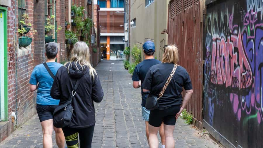 Melbourne: History and Donuts Walking Tour - Collins Street and the Mitre Tavern tell the money story