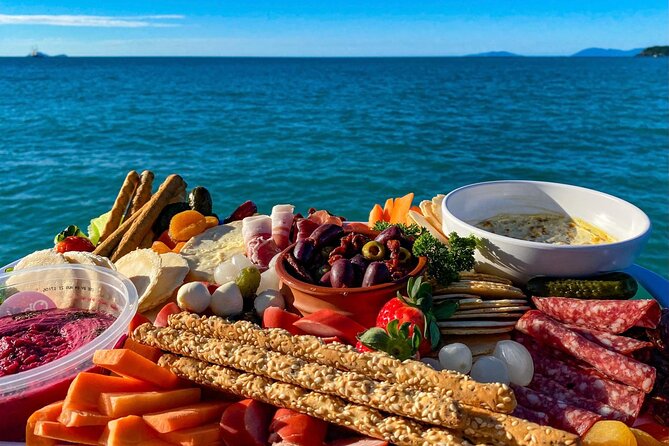 NEW SUNSET TOUR-Airlie Beach Sunset Sail in Style- BYO drinks - Food, music, and the social side of the boat