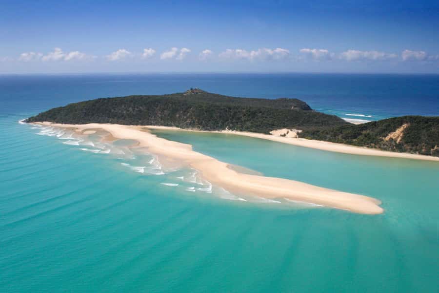 Rainbow Beach: Kayaking with Dolphins and Beach 4WD Tour - Double Island Point and the lighthouse from the water