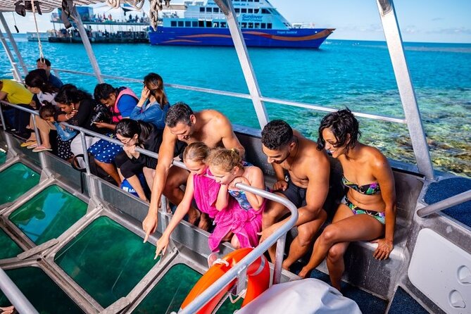 Sunlover Reef Cruises Cairns Great Barrier Reef Experience - The waterslide, sun deck, and ocean pool