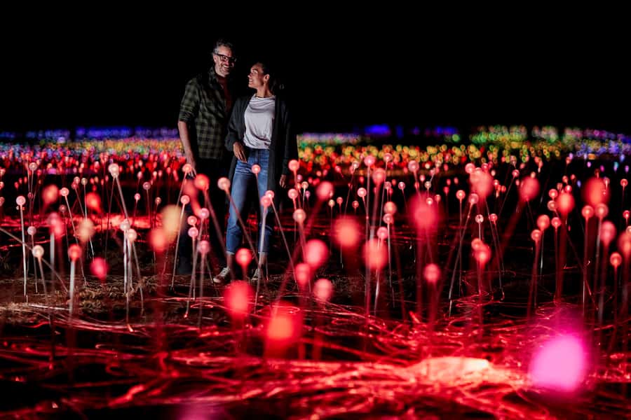 Uluru: Field of Light Sunrise Tour with Hot Drinks - The pre-dawn pickup from Yulara