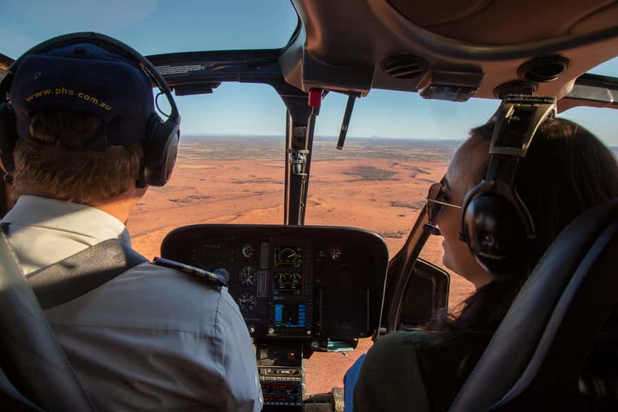 Yulara: Uluru and Kata Tjuta Sunset Helicopter Tour - Uluru at sunset, with room for the right-side and left-side views